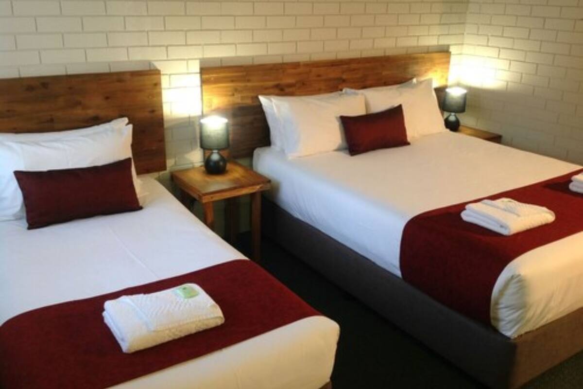 Twin Room (1 Queen + 1 Single) | Desk, iron/ironing board, WiFi (free), bed sheets