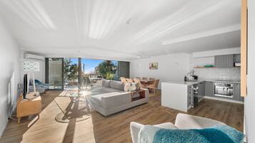 Superior Apartment | Living area | TV, ping pong