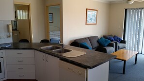 Standard Apartment, 1 Bedroom, Kitchen | Living area - Mango Cove Resort (Labrador)