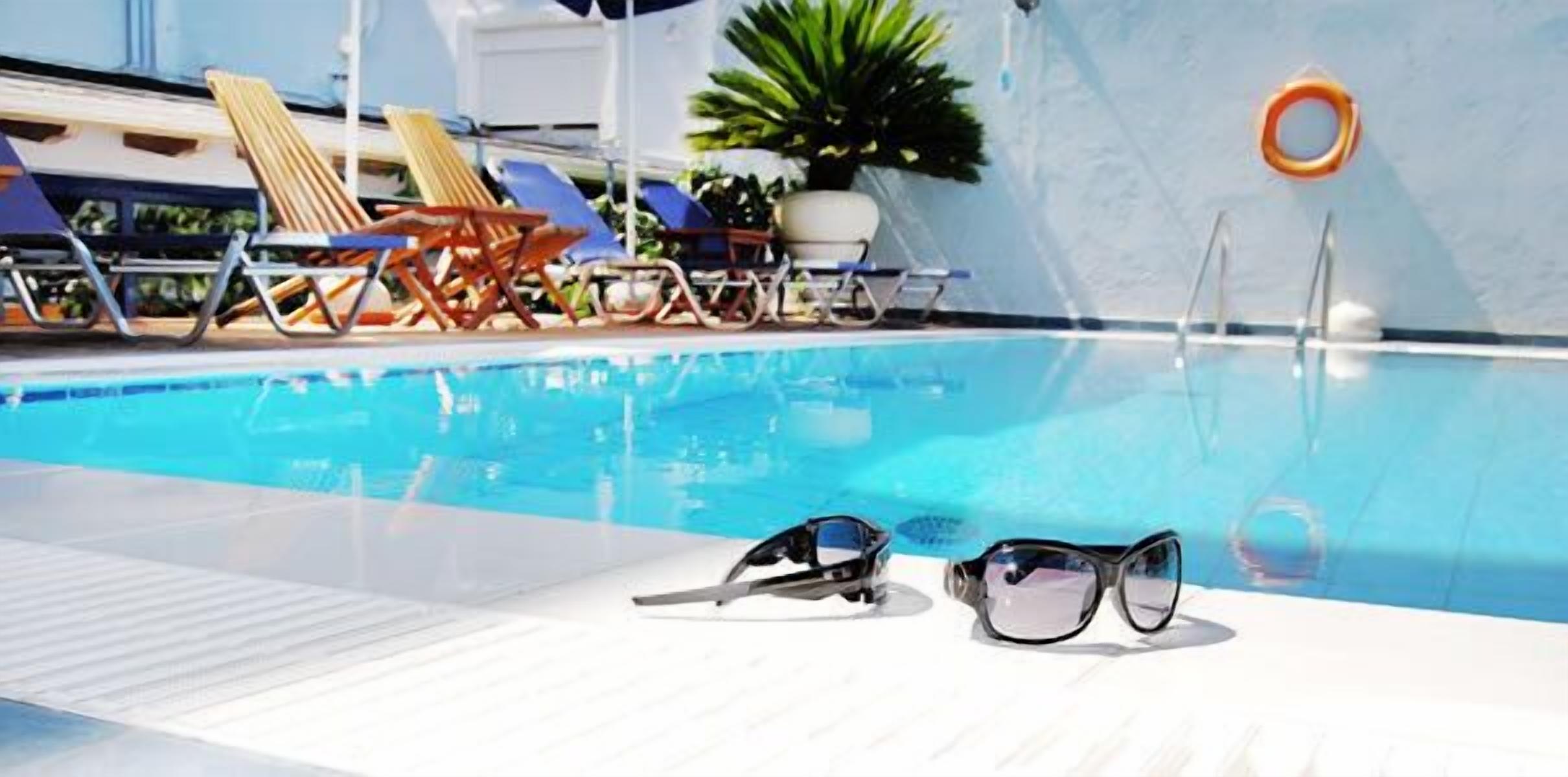 outdoor pool, pool loungers