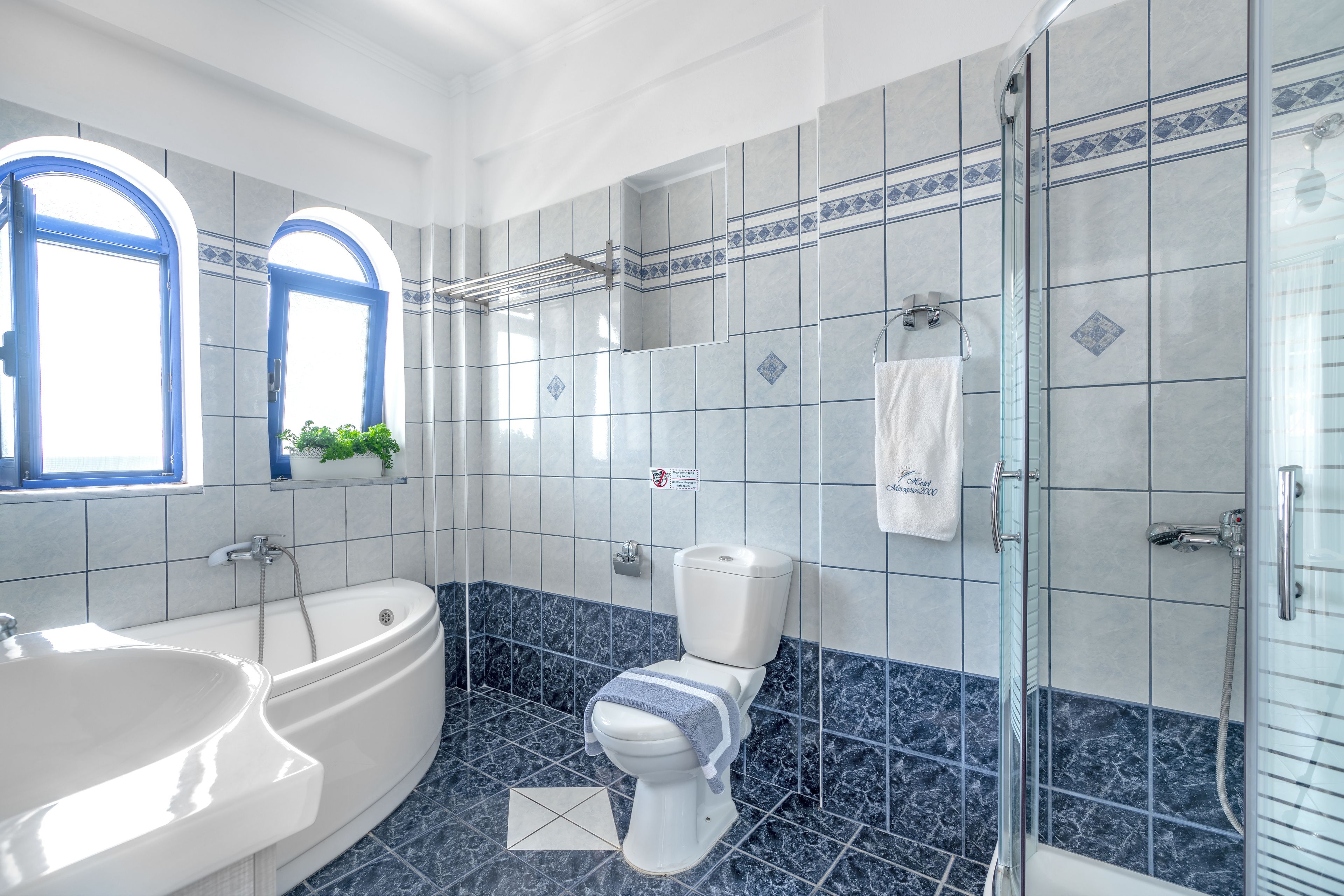 luxury apartment, sea view (with kitchen) | bathroom | deep-soaking bathtub, towels