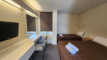 Economy Twin Room, 1 Bedroom, Non Smoking | Iron/ironing board, free WiFi, bed sheets