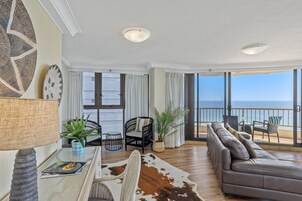 Three Bedroom Apartment - Ocean Views on the top floor | Living area | TV