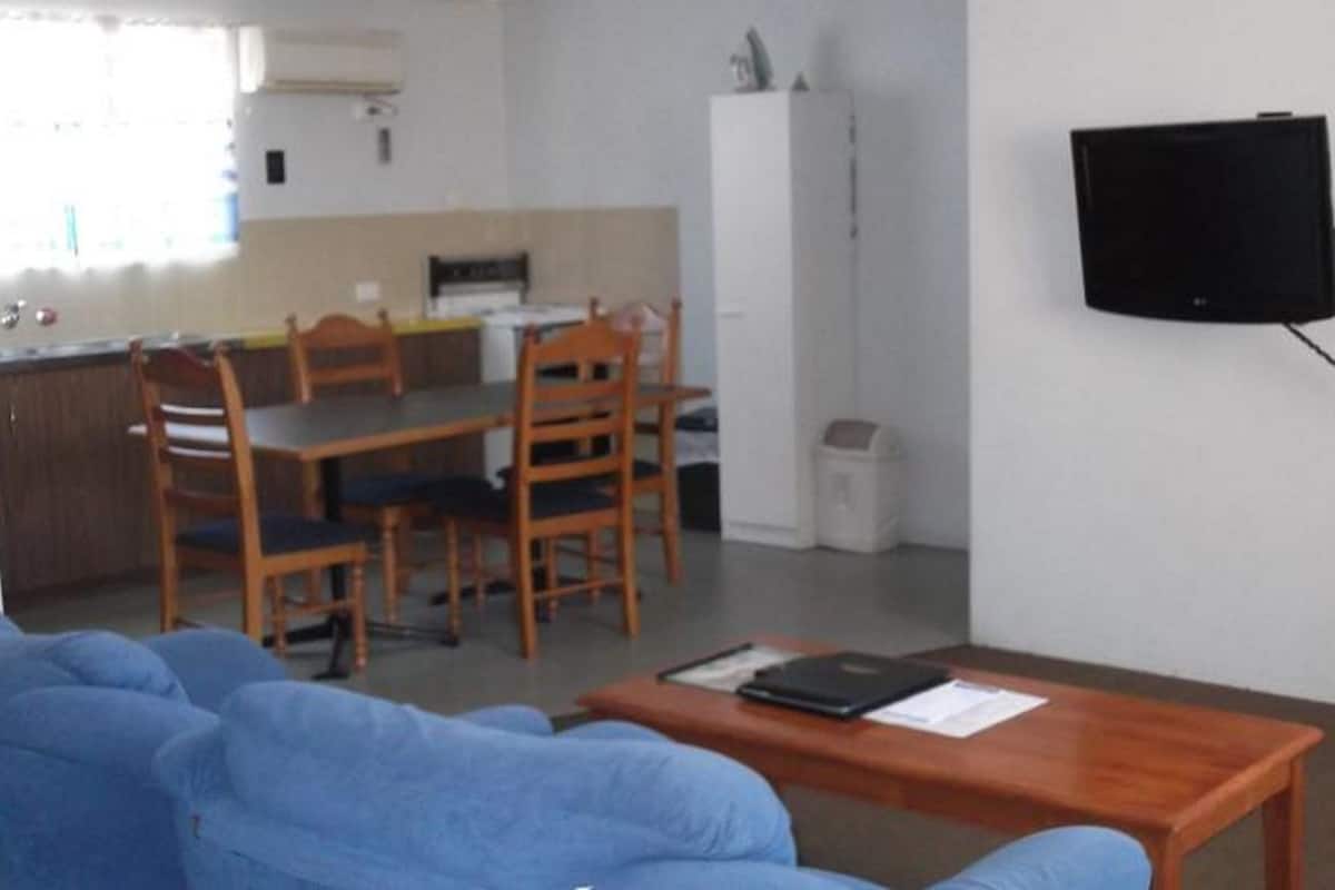 Junior Apartment, 2 Bedrooms | Living area | 32-inch Smart TV with digital channels, TV
