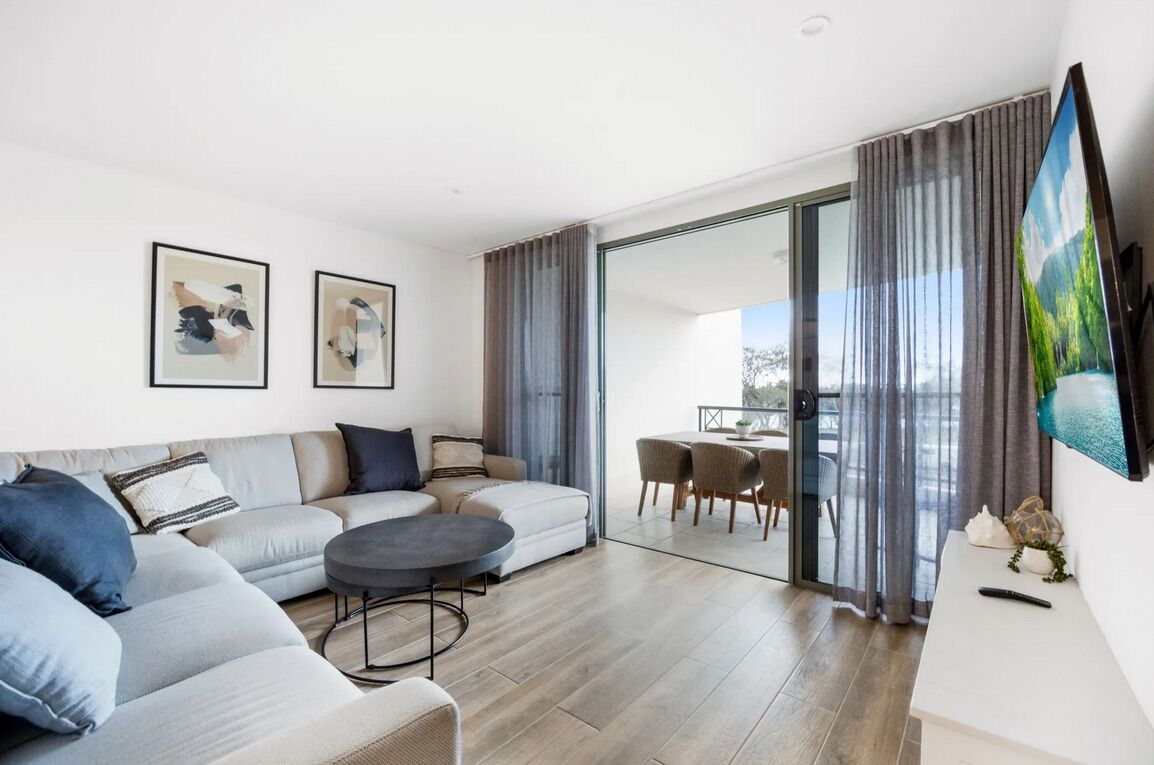 Apartment Sixteen (2 Bedrooms) | Living area | Flat-screen TV, DVD player, iPod dock