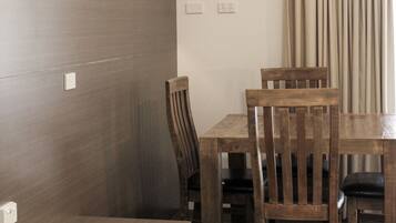 Room (2 Bedroom Family Unit) | Living area | Flat-screen TV