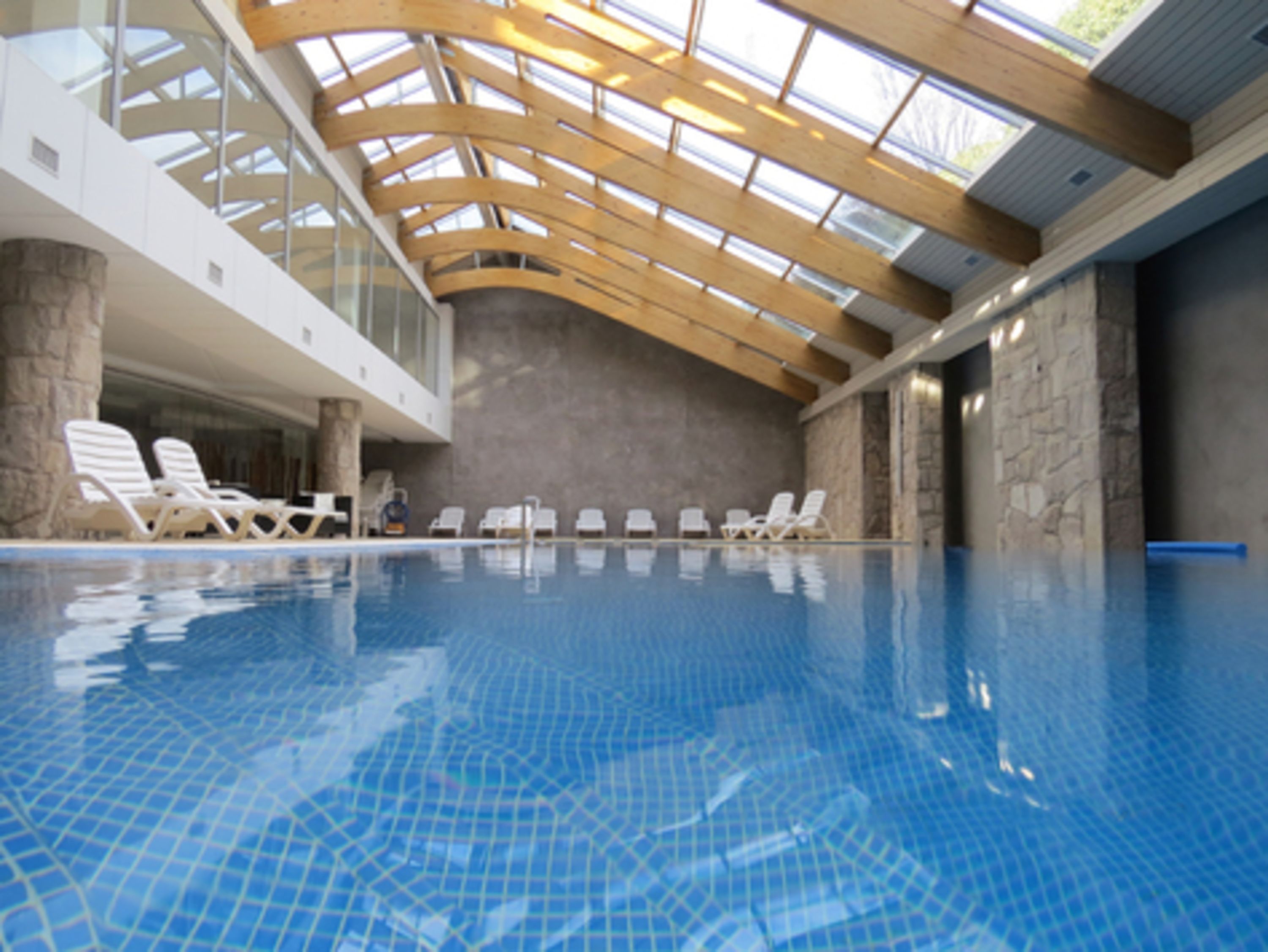 indoor pool, outdoor pool, pool loungers