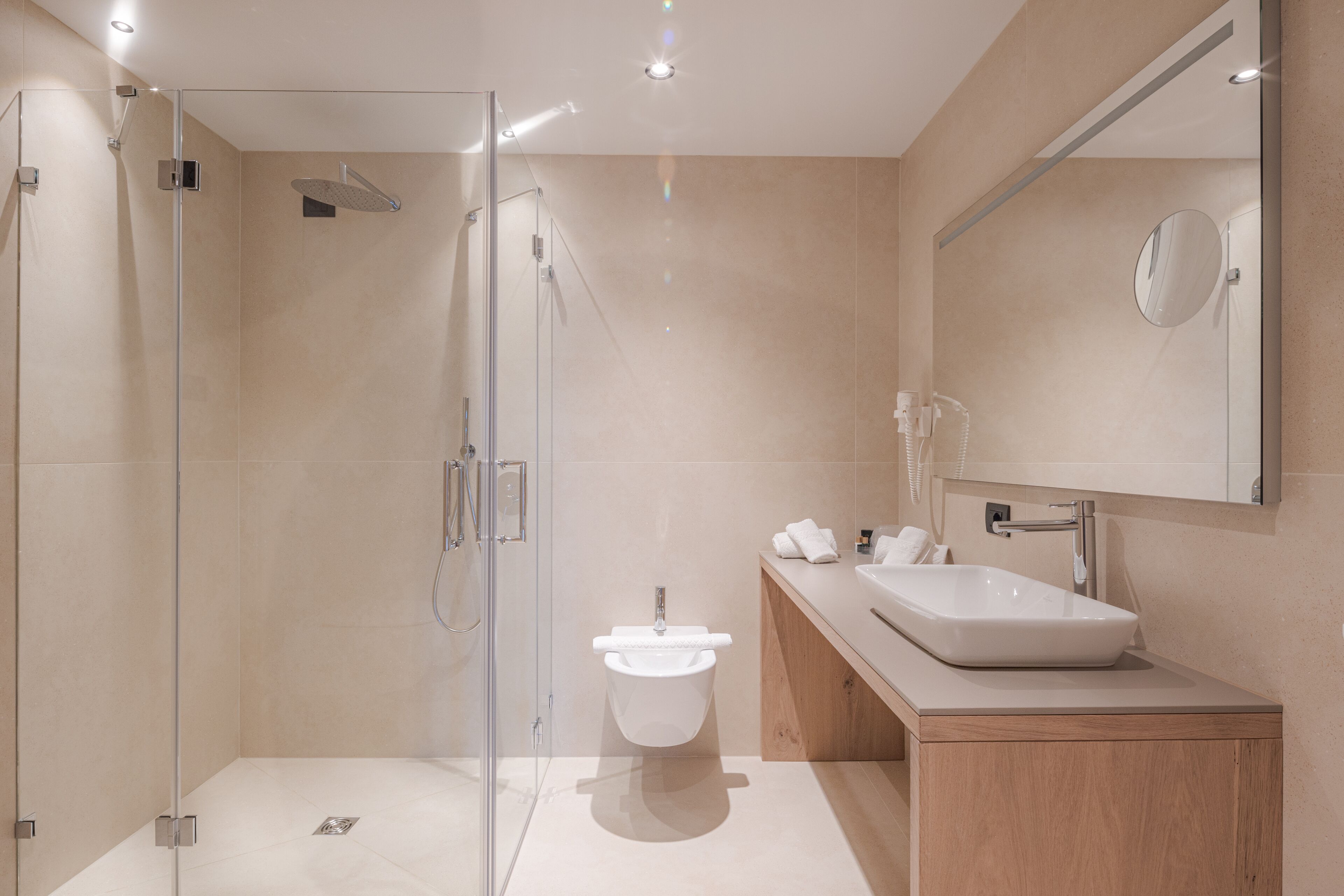 living suite family | bathroom | shower, hair dryer, bathrobes, slippers