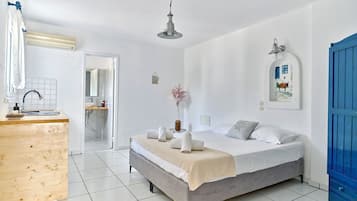 Appartement Familial, vue partielle sur la mer | Coffres-forts dans les chambres, fer et planche Ă  repasser