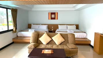 Family Room | Minibar, in-room safe, free WiFi, bed sheets