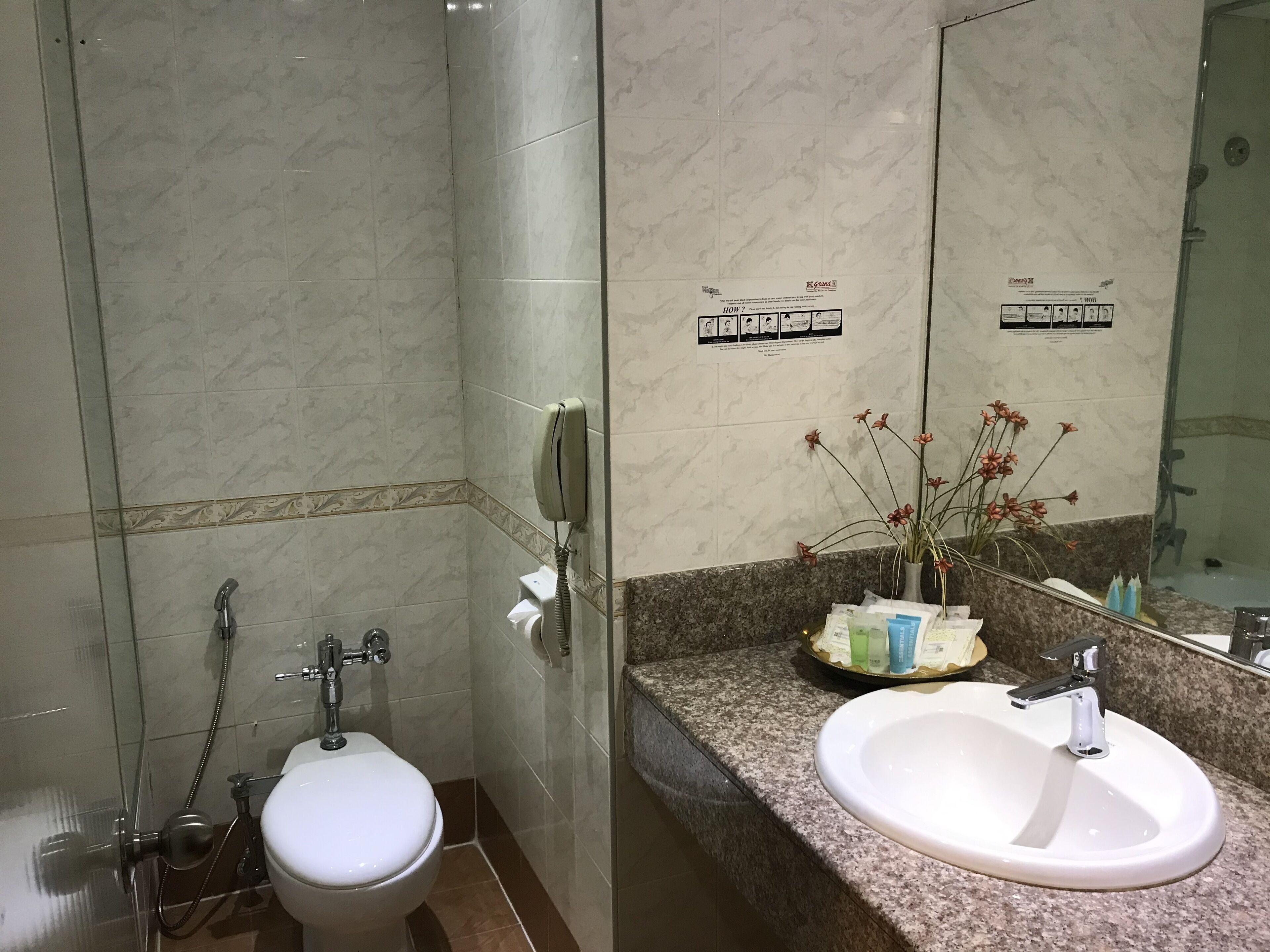 presidential suite | bathroom | combined shower/bathtub, rainfall showerhead, free toiletries