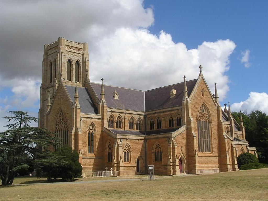 A large church with a prominent tower and arched windows.