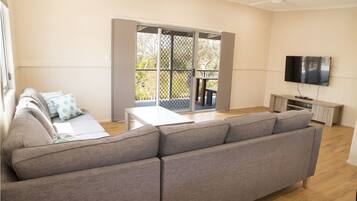 4 Bedroom Deluxe Villa | Living area | TV