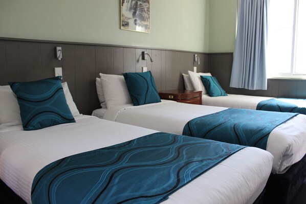 Minibar, bureau, chambres insonorisées, fer et planche à repasser