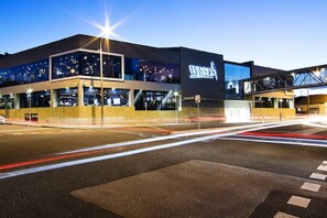 A modern building with a large sign reading "WESTIN".