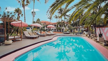Outdoor pool, open 7:00 AM to 9:00 PM, pool umbrellas, sun loungers