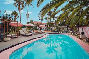 Outdoor pool, open 7:00 AM to 9:00 PM, pool umbrellas, sun loungers