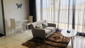 Deluxe Apartment, 1 Bedroom | 1 bedroom, individually decorated, individually furnished, desk