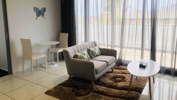 Deluxe Apartment, 1 Bedroom | Individually decorated, individually furnished, desk, iron/ironing board