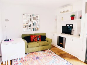 Standard Apartment, 1 Bedroom | Living area | Flat-screen TV, fireplace, DVD player - Hiigh Apartments (Prahran)