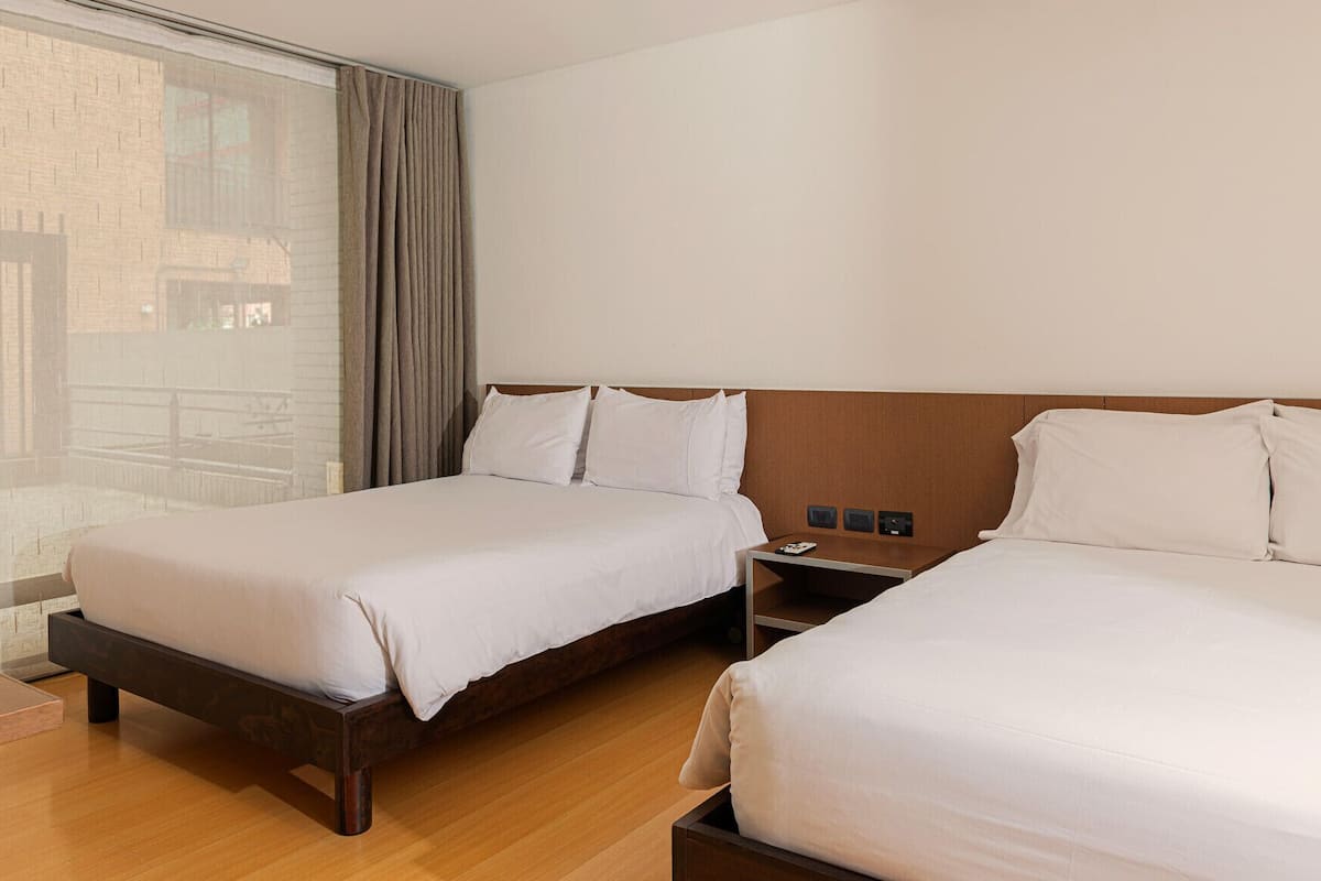 2 bedrooms, premium bedding, in-room safe, desk