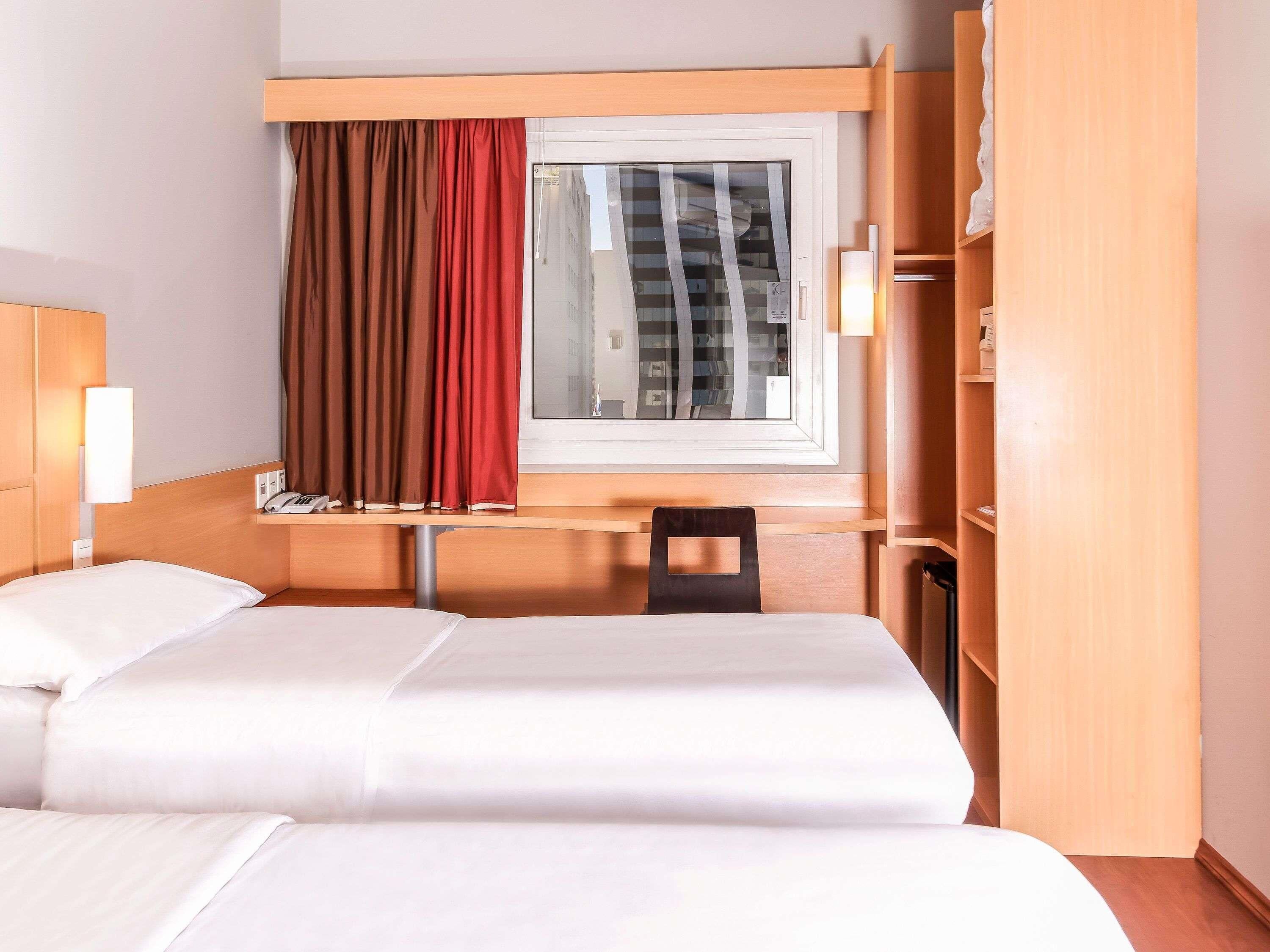 Standard Twin Room, 2 Twin Beds | Minibar, in-room safe, desk, soundproofing