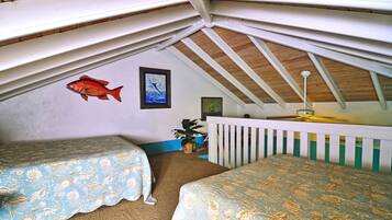 Loft, 2 Double Beds, Partial Ocean View (Mountainside) | 1 bedroom, premium bedding, individually decorated