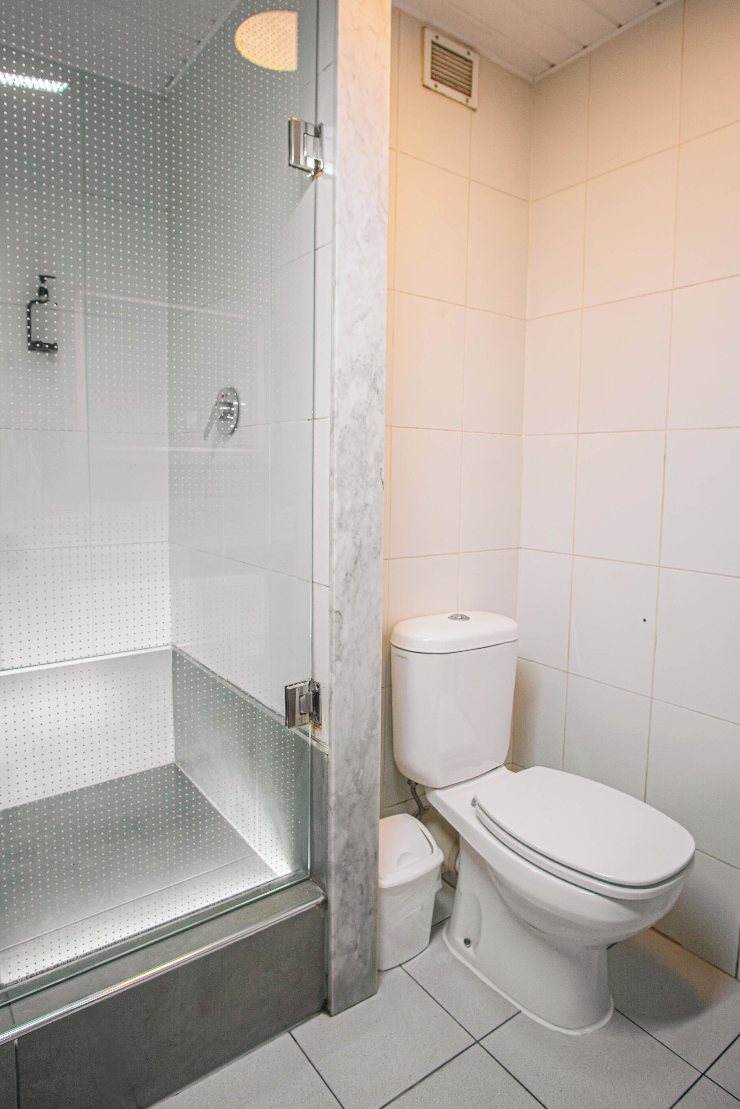 Shower, eco-friendly toiletries, hair dryer, towels