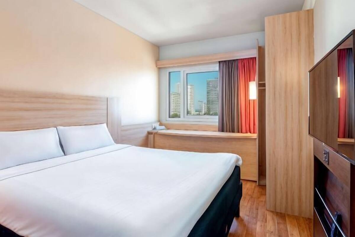 Premium bedding, memory foam beds, in-room safe, blackout drapes