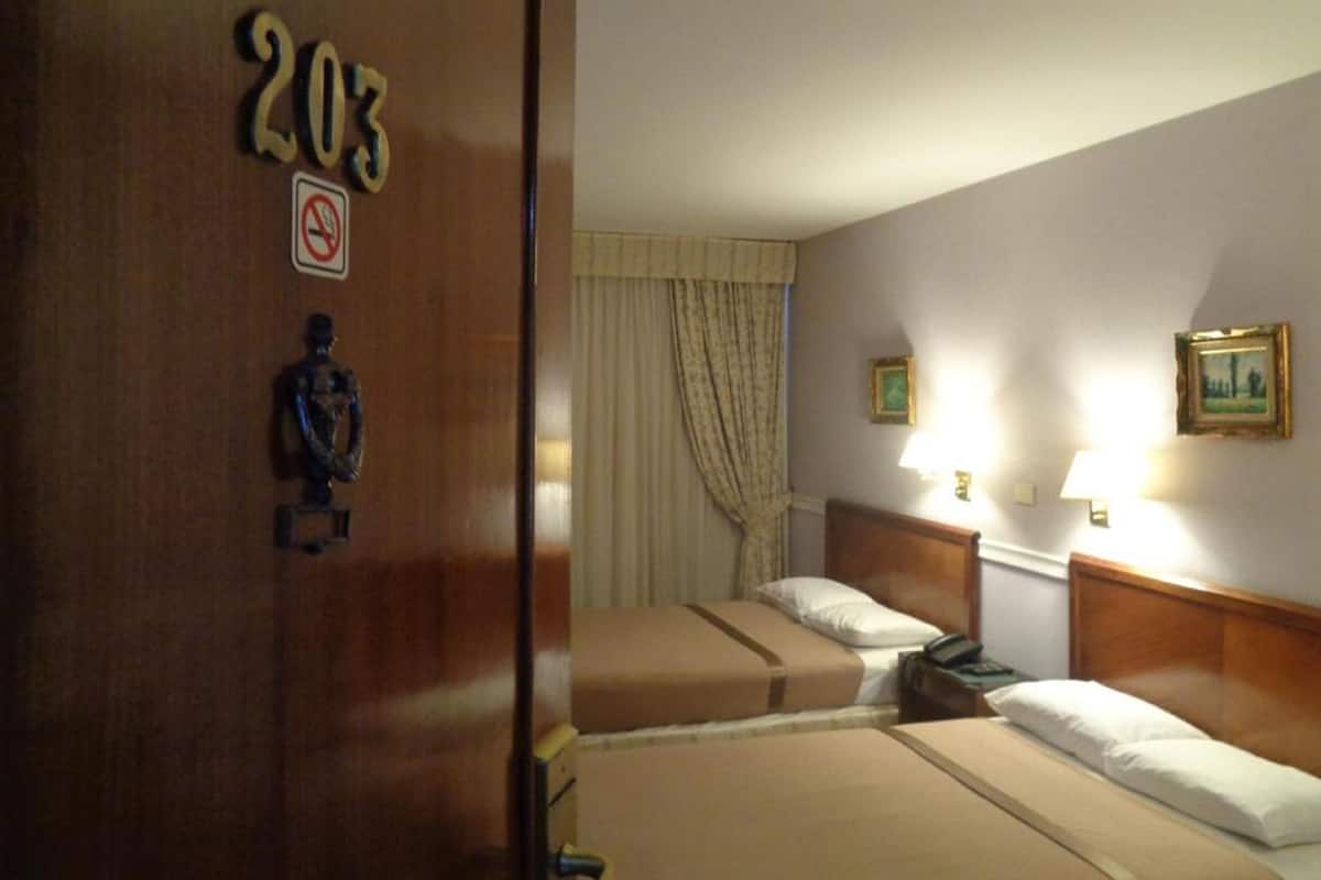 Twin kamer | 1 slaapkamer, luxe beddengoed, pillowtop-bedden, een minibar