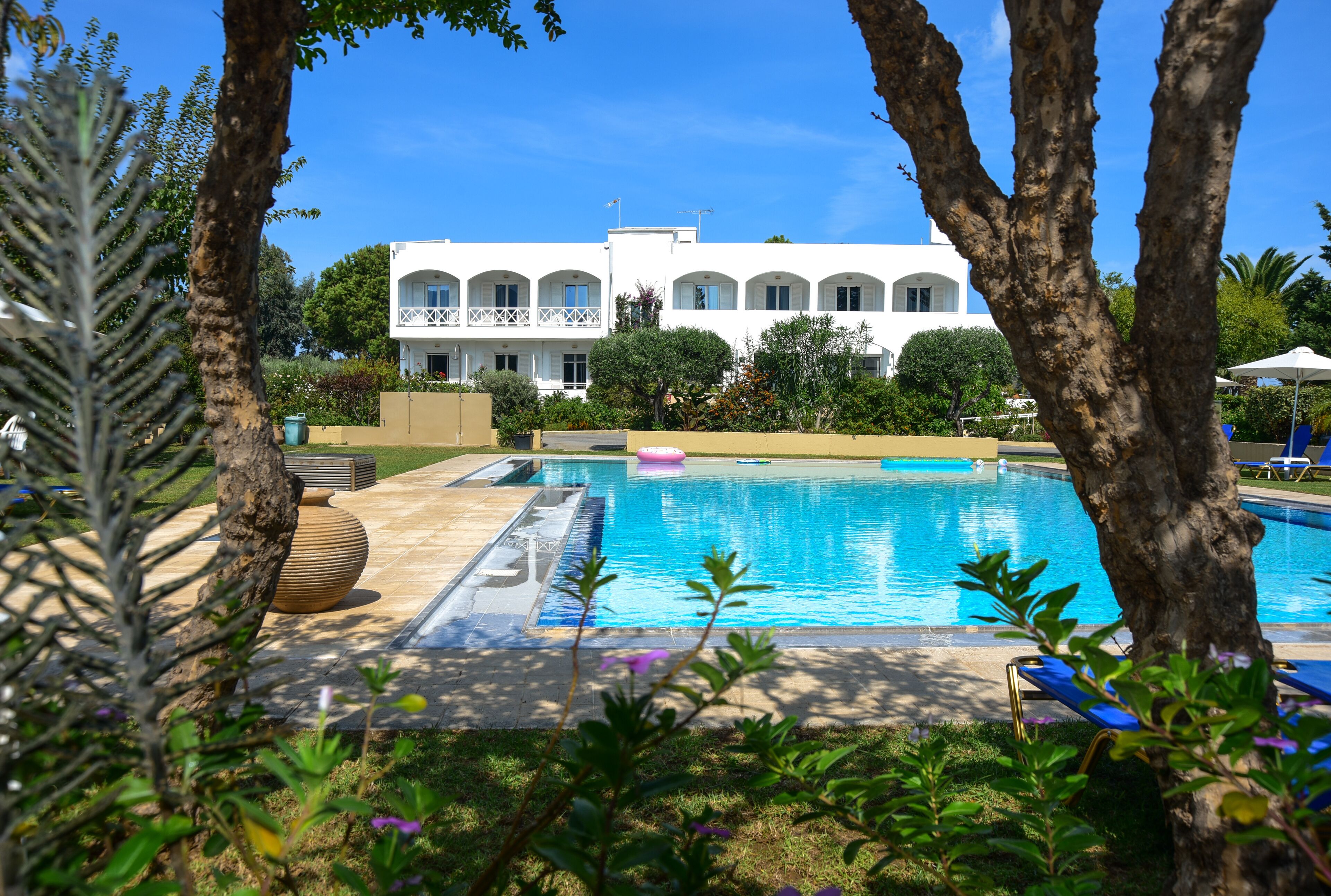 outdoor pool, pool umbrellas, pool loungers