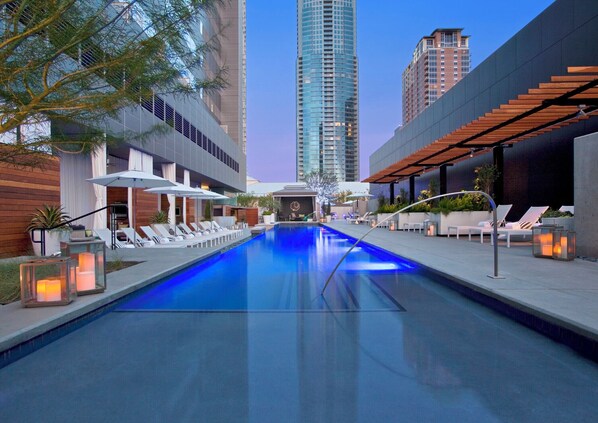 Outdoor pool, open 7:00 AM to 8:00 PM, cabanas (surcharge)