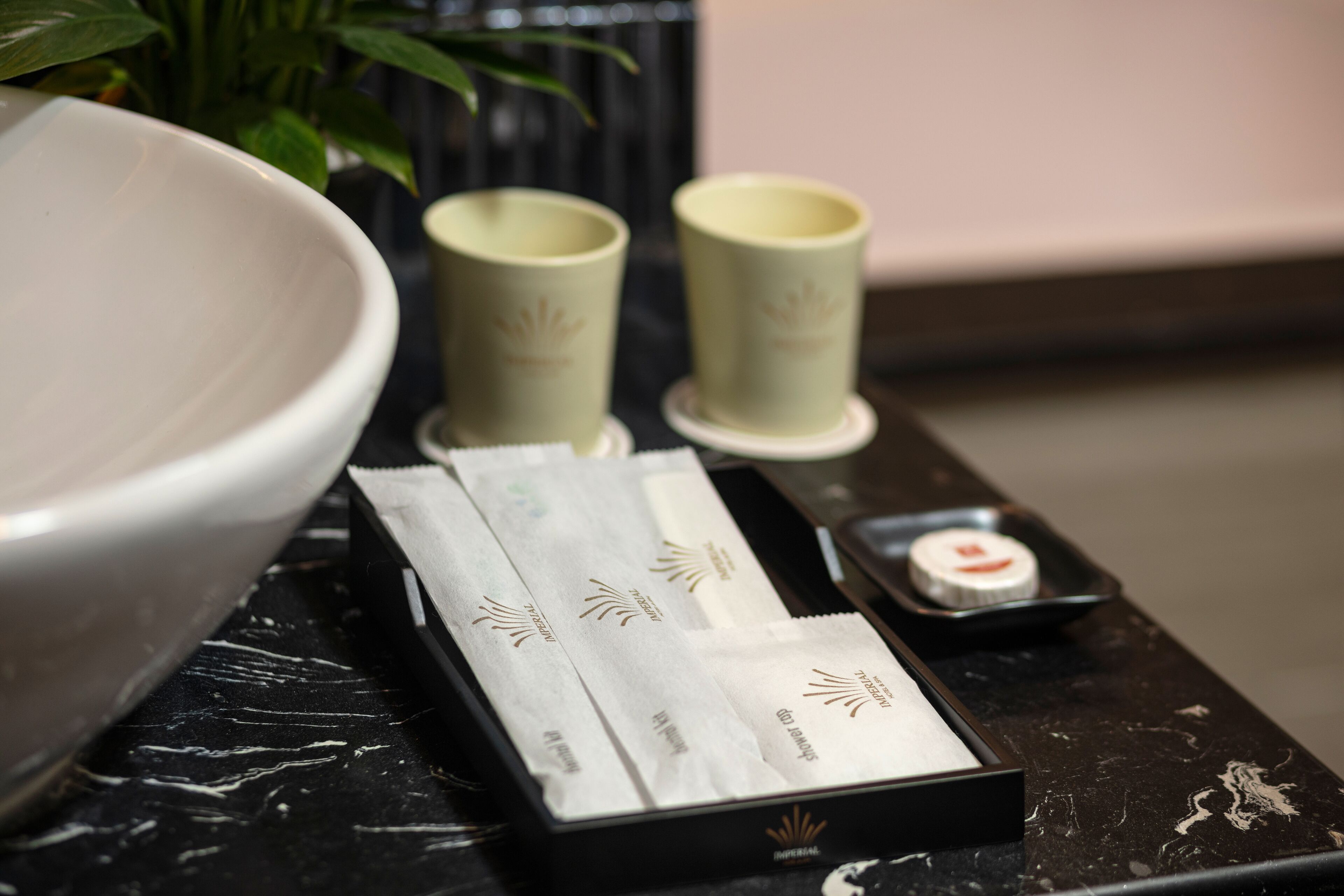 deep-soaking bathtub, rainfall showerhead, designer toiletries