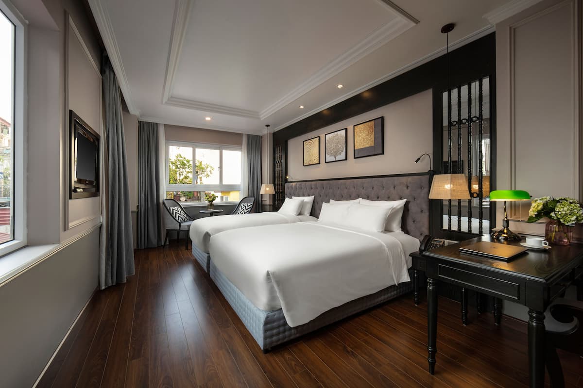Family Suite Room | Minibar, in-room safe, individually decorated, individually furnished