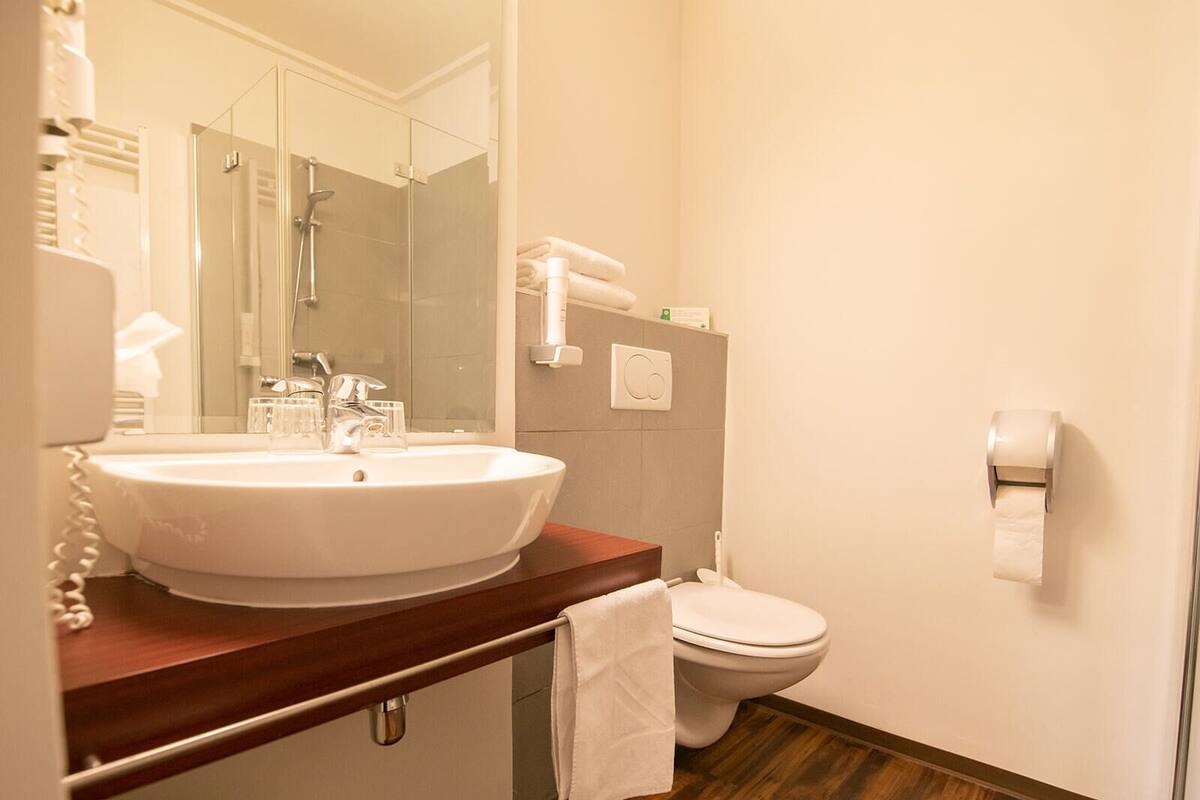 hair dryer, bathrobes, towels