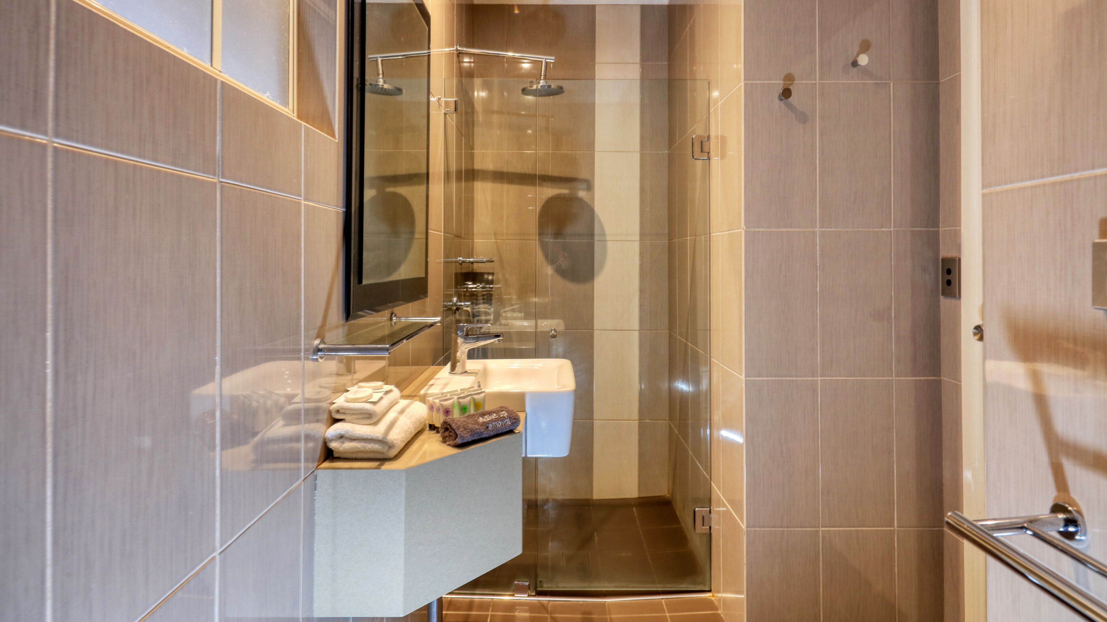 Shower, free toiletries, hair dryer, towels