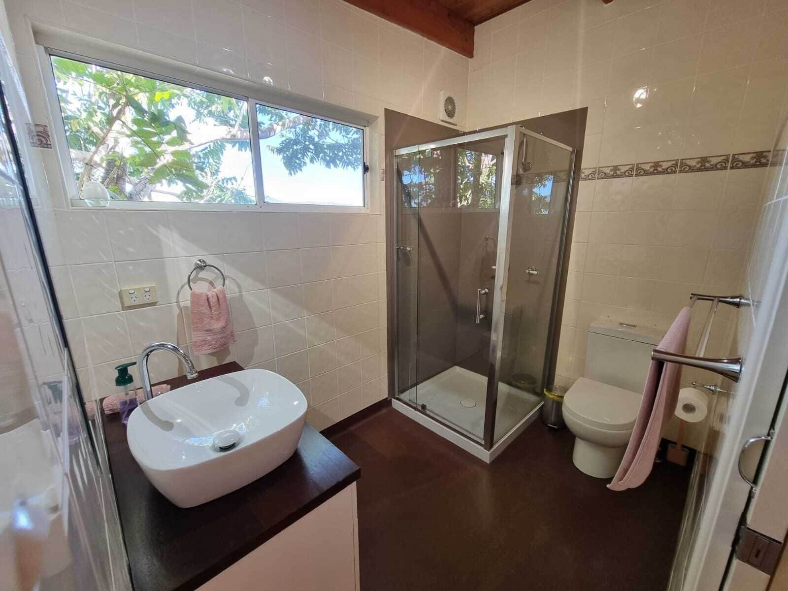 Standard Studio, 1 Queen Bed, Kitchen, Garden View (Wattle Suite) | Bathroom | Shower, free toiletries, hair dryer, towels