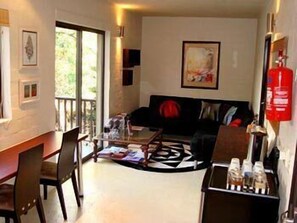 Chambre Double | Coin séjour