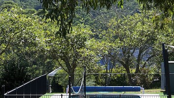 Seasonal outdoor pool, pool loungers