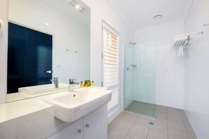 Deluxe Suite, 2 Bedrooms, Accessible, Ground Floor | Bathroom | Shower, rainfall showerhead, free toiletries, hair dryer