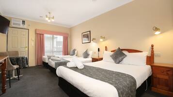 Standard Room, Non Smoking, Kitchenette (Queen/Single/Single) | Iron/ironing board, free WiFi, bed sheets