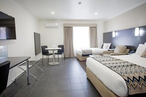 Hypo-allergenic bedding, down duvets, pillow-top beds, minibar