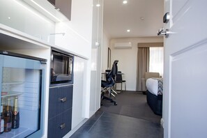 Hypo-allergenic bedding, down duvets, pillow-top beds, minibar