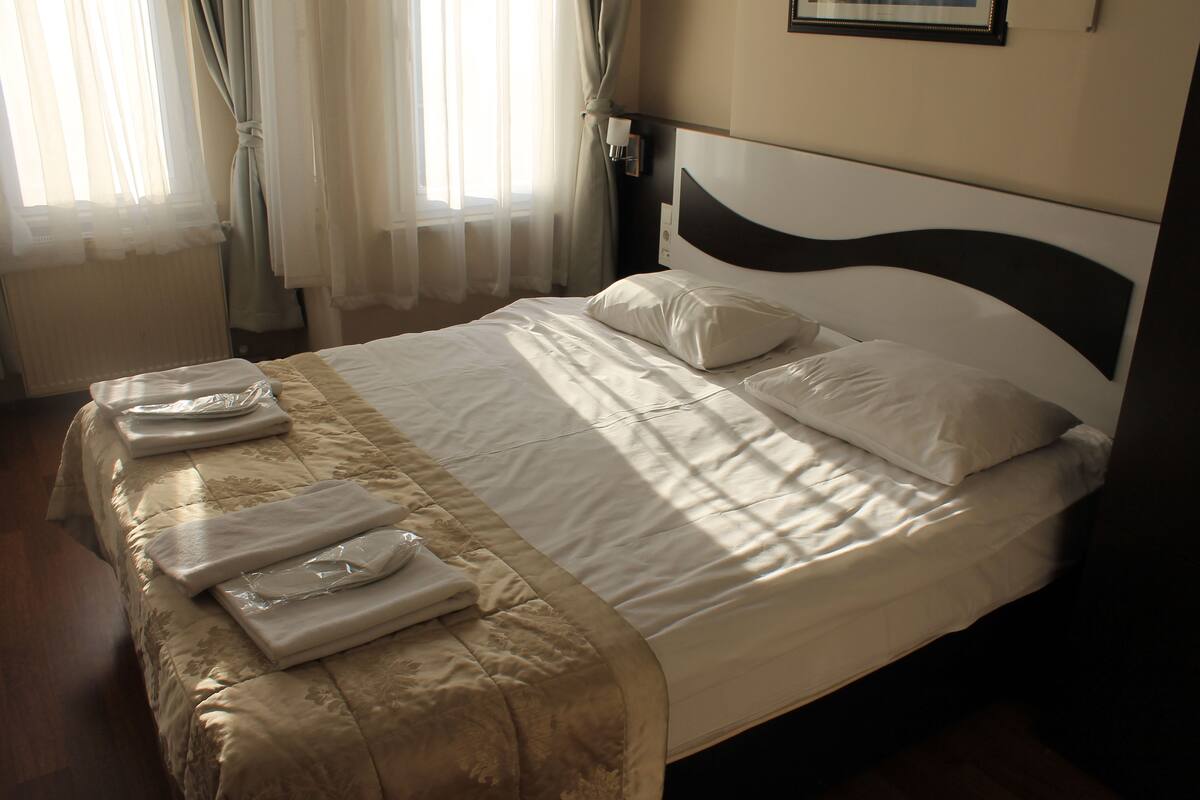Down comforters, in-room safe, blackout drapes
