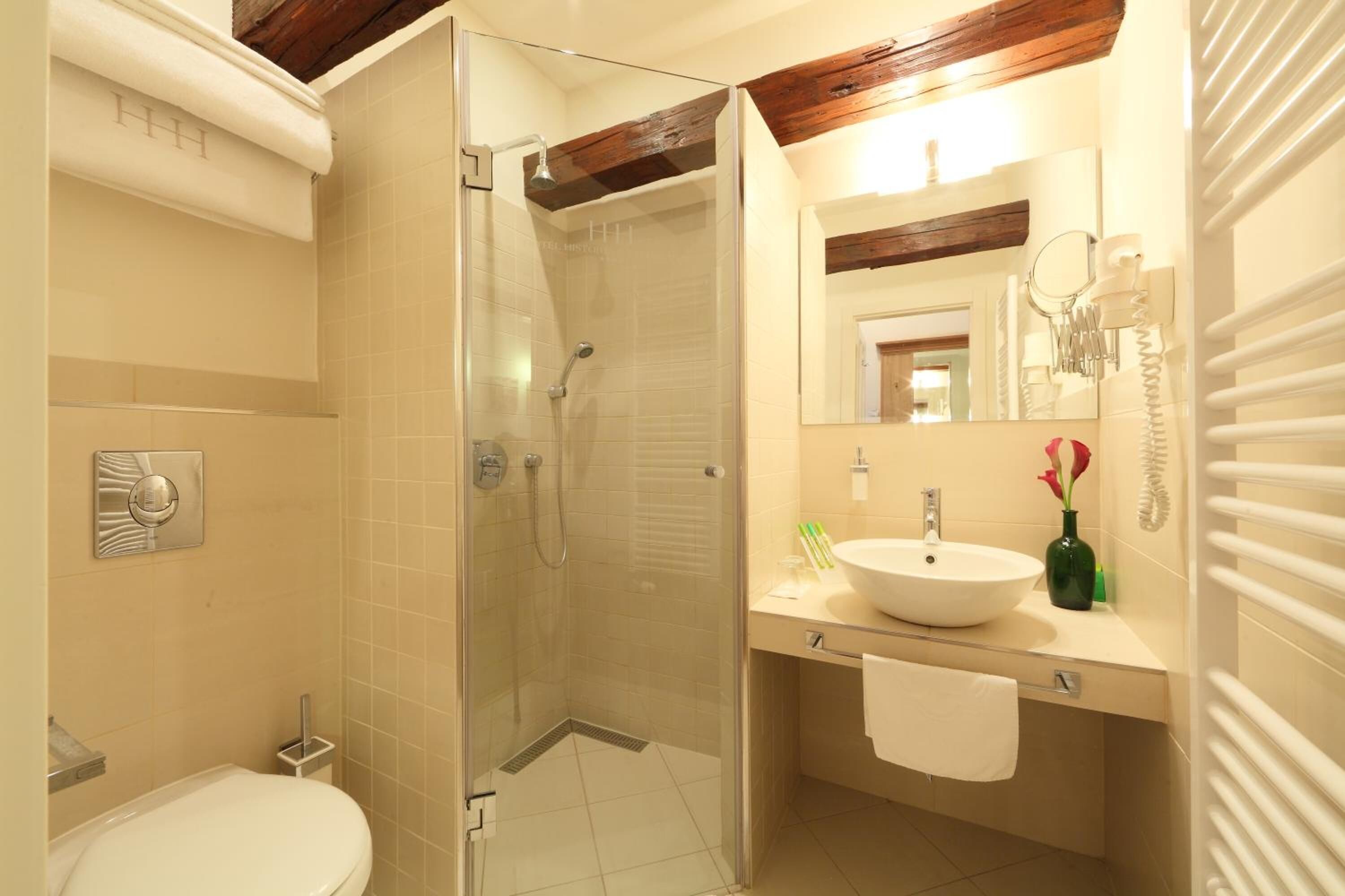 standard double or twin room | bathroom | shower, hair dryer, bathrobes, slippers