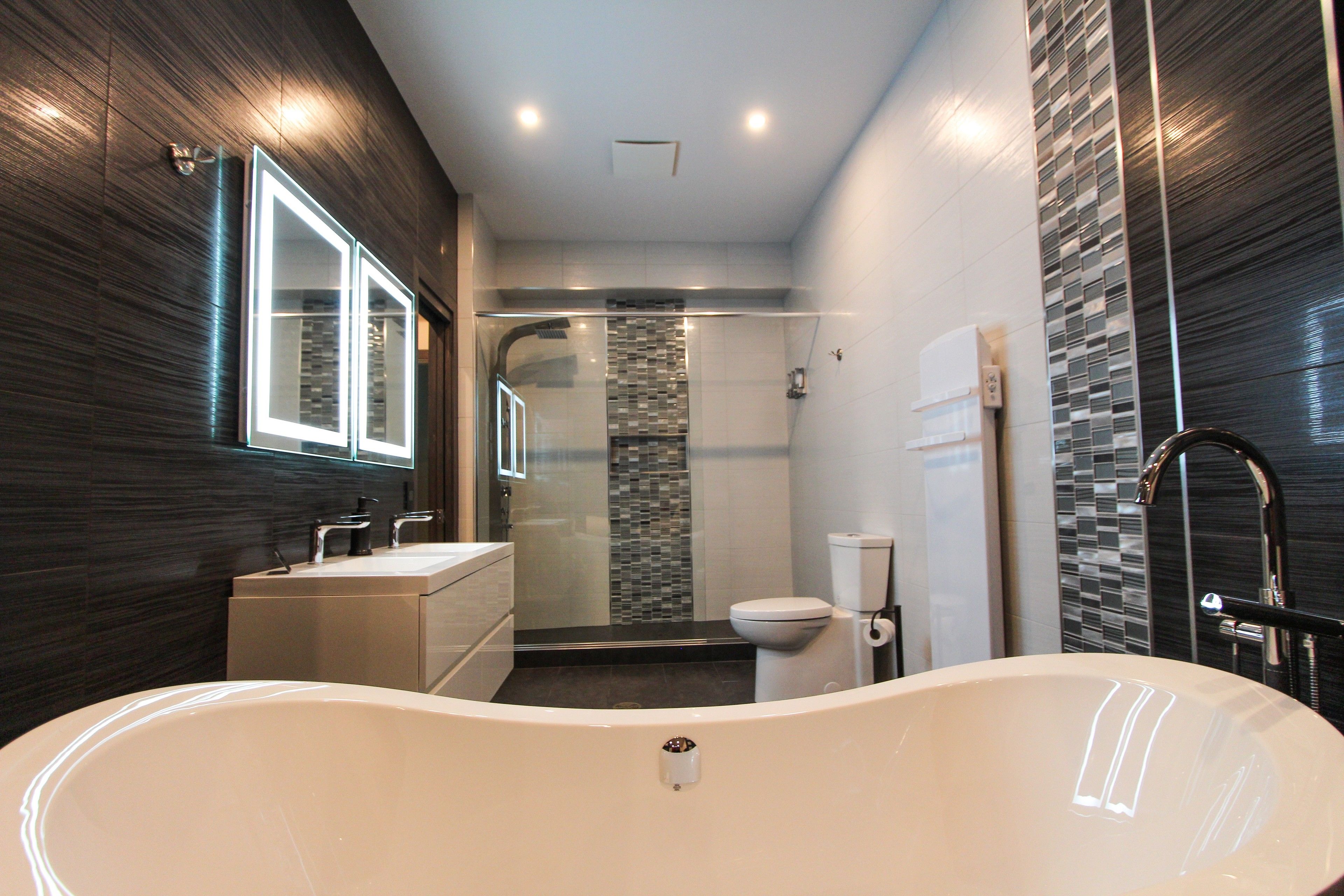 superior suite, refrigerator & microwave | bathroom | combined shower/bathtub, designer toiletries, hair dryer, bathrobes