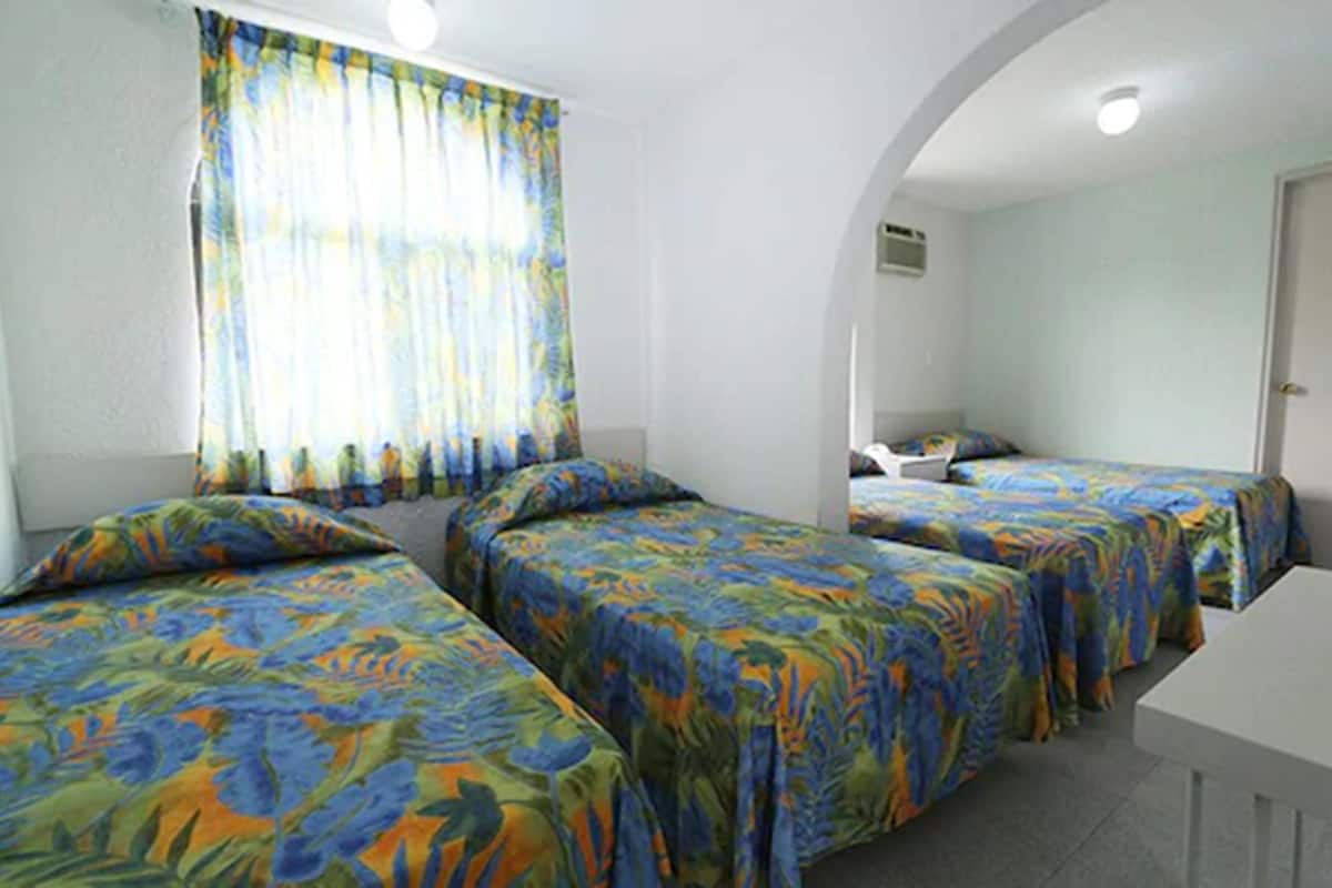 Habitación cuádruple "Tulipanes"