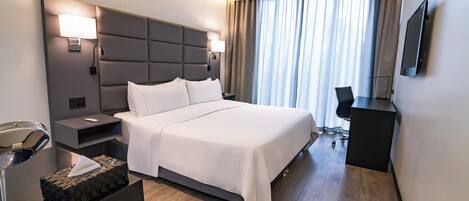 Luxe beddengoed, donsdekens, een minibar, een kluis op de kamer