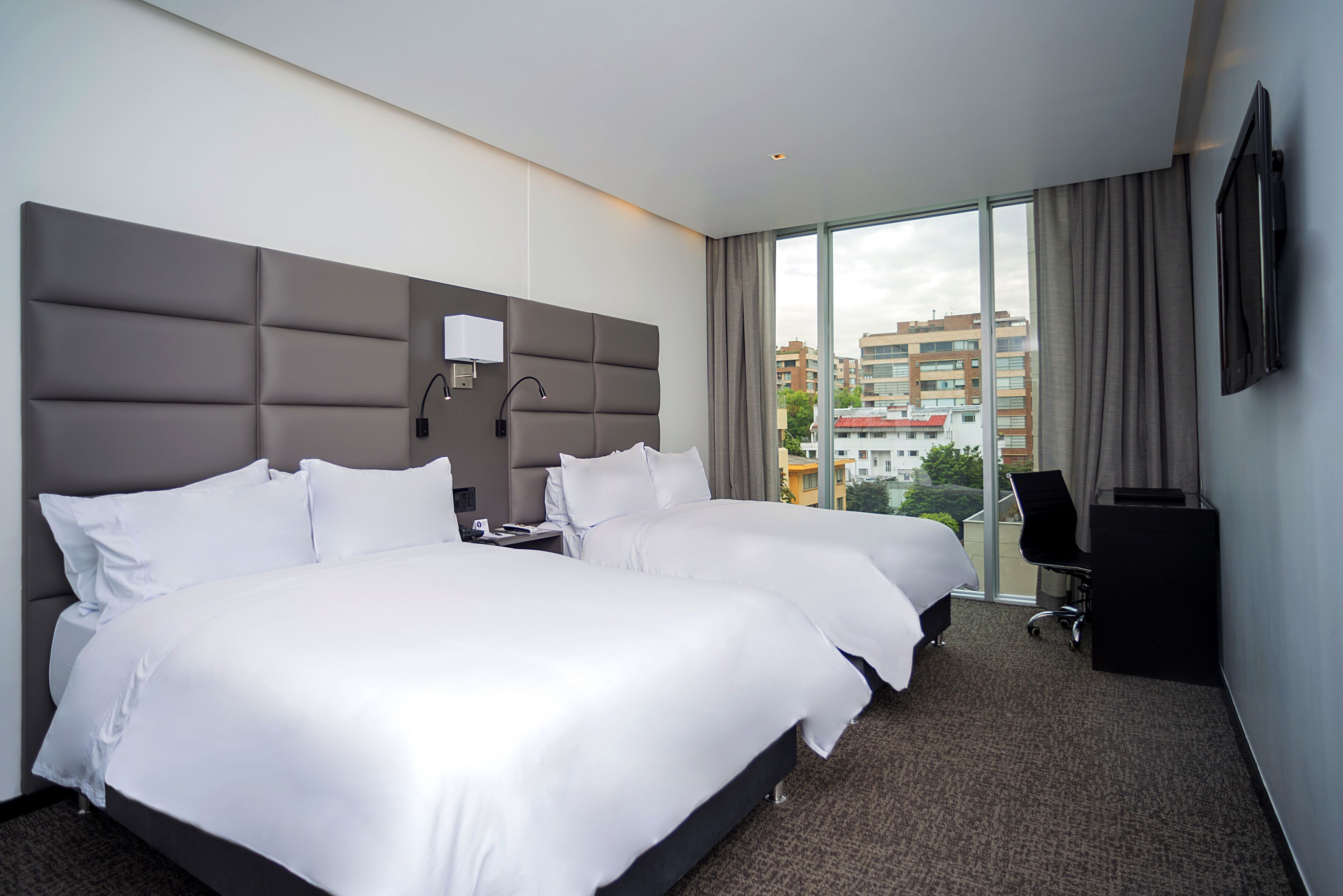 Premium bedding, down comforters, minibar, in-room safe