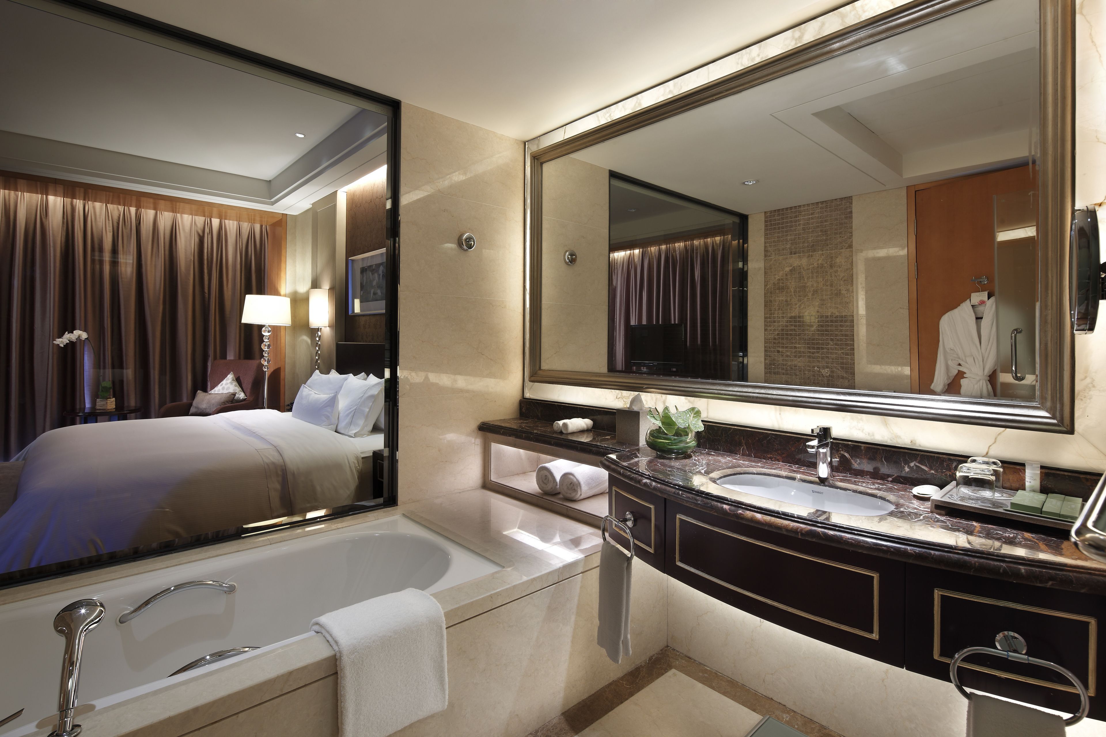 separate bathtub and shower, rainfall showerhead, hair dryer, bathrobes